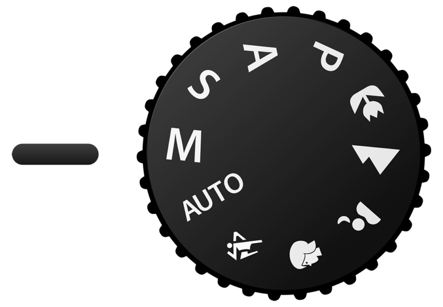 Manual mode selected on the mode dial of a digital camera