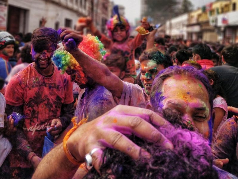A large crowd playing holi, the Hindu festival of colors just before the ascent of spring
