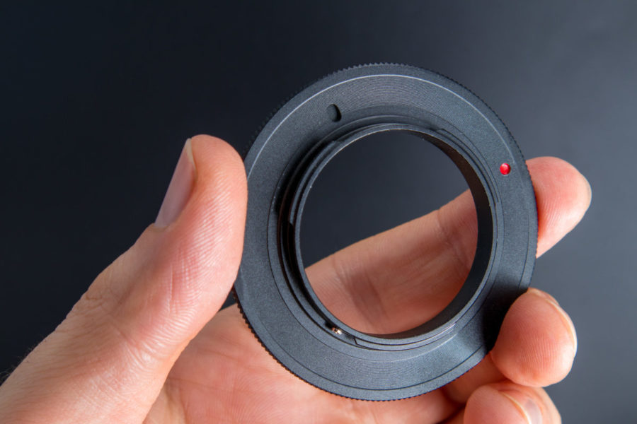 This is Reverse Lens Mount designed to fit a 55mm filter thread and a Micro Four Thirds Camera body. 
