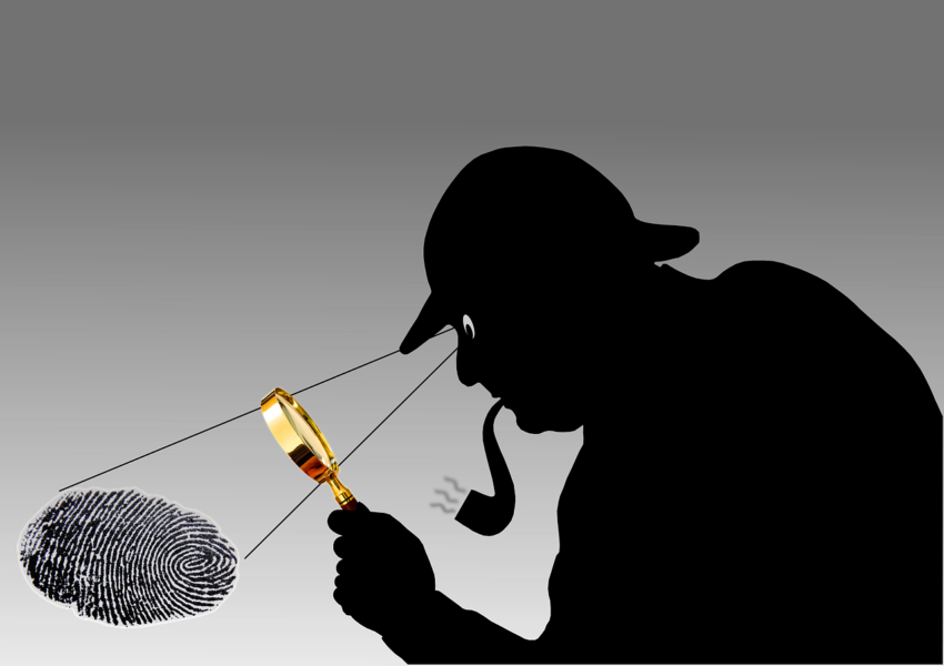 Sherlock Holmes with his magnifying glass looking at a fingerprint