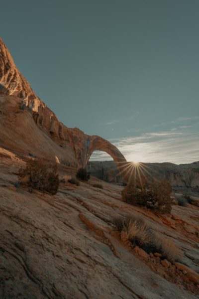 Sun star effect created using the sunlight on a rocky mountain