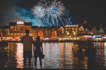 Couple doing fireworks photography at Disney's Boardwalk Resort, Kissimmee, United States